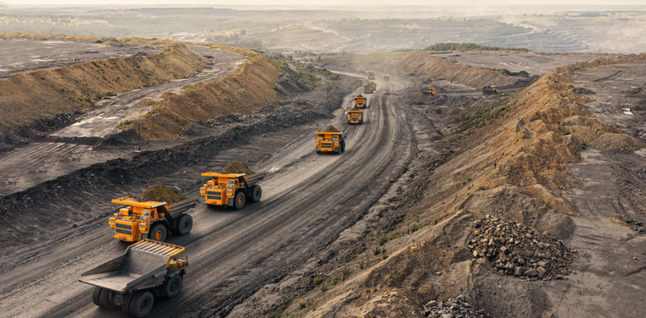 Dump trucks leaving a quarry