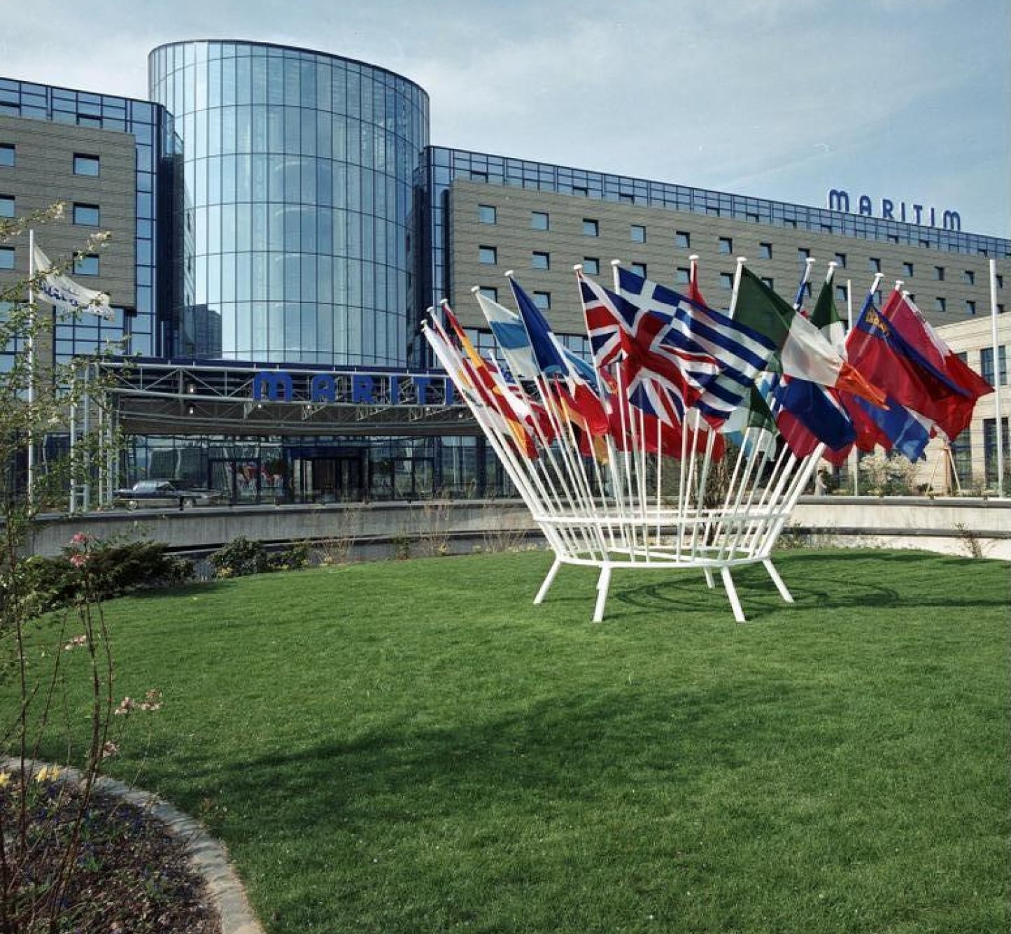 Flags outside Hotel Maritim in Bonn, 1990.