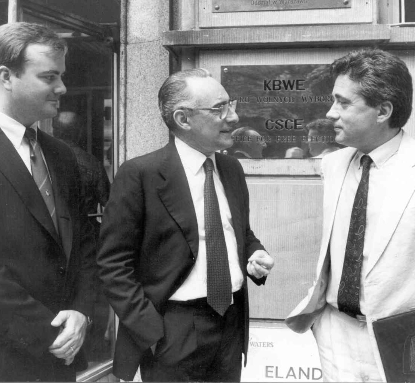 Amb. Luchino Cortese (centre), Director of the Office for Free Elections (later renamed the Office for Democratic Institutions and Human Rights, ODIHR), in front of the first office in 1991.