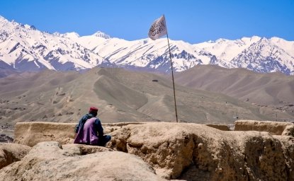 Man Taliban Flag