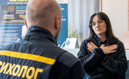 An instructor teaches a relaxation technique during a training session in Kyiv. Participants included psychologists from Ukraine’s State Emergency Services. Courtesy International Medical Corps, used with permission.