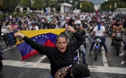 Protesters demonstrate against the official election results declaring President Nicolas Maduro's reelection, the day after the vote in Caracas, Venezuela, Monday, July 29, 2024. (