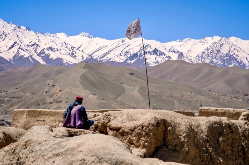 Man Taliban Flag