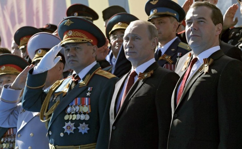 Sergey Shoigu, Vladimir Putin and Dmitry Medvedev at the military parade marking the 69th anniversary of Victory in the Great Patriotic War.
