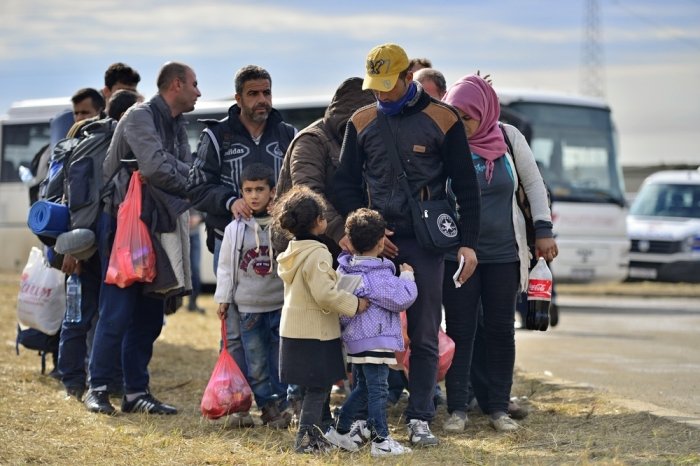Refugees entering a refugee camp