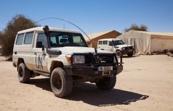 Armored patrol vehicles parked in Burkina Faso UN military base in Timbuktu region at United Nation peacekeeping mission in Mali
