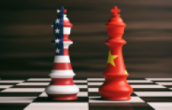 US and Chinese Chess Pieces Facing Each Other
