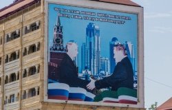 Poster of Putin and Kadyrov in Grozny, Russia. It says: I commit everything I do to common people. That's why I know I follow the right path.