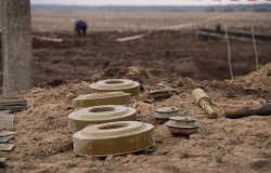 Demining by troops of the territory. Many mines, shells, artillery, grenades, fragmentation grenades