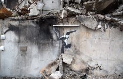 Graffiti art of a gymnast in rubble